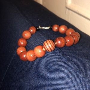Homemade wooden bead bracelet. (Earth Collection)